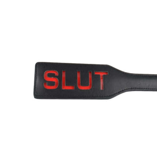 Image of SM Naughty Me Spanking Paddle, crafted from top-grade PU Leather for a luxurious feel.