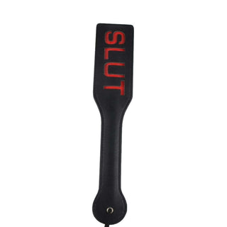 What you see is an image of SM Naughty Me Spanking Paddle, versatile for light taps or firm smacks in intimate play.