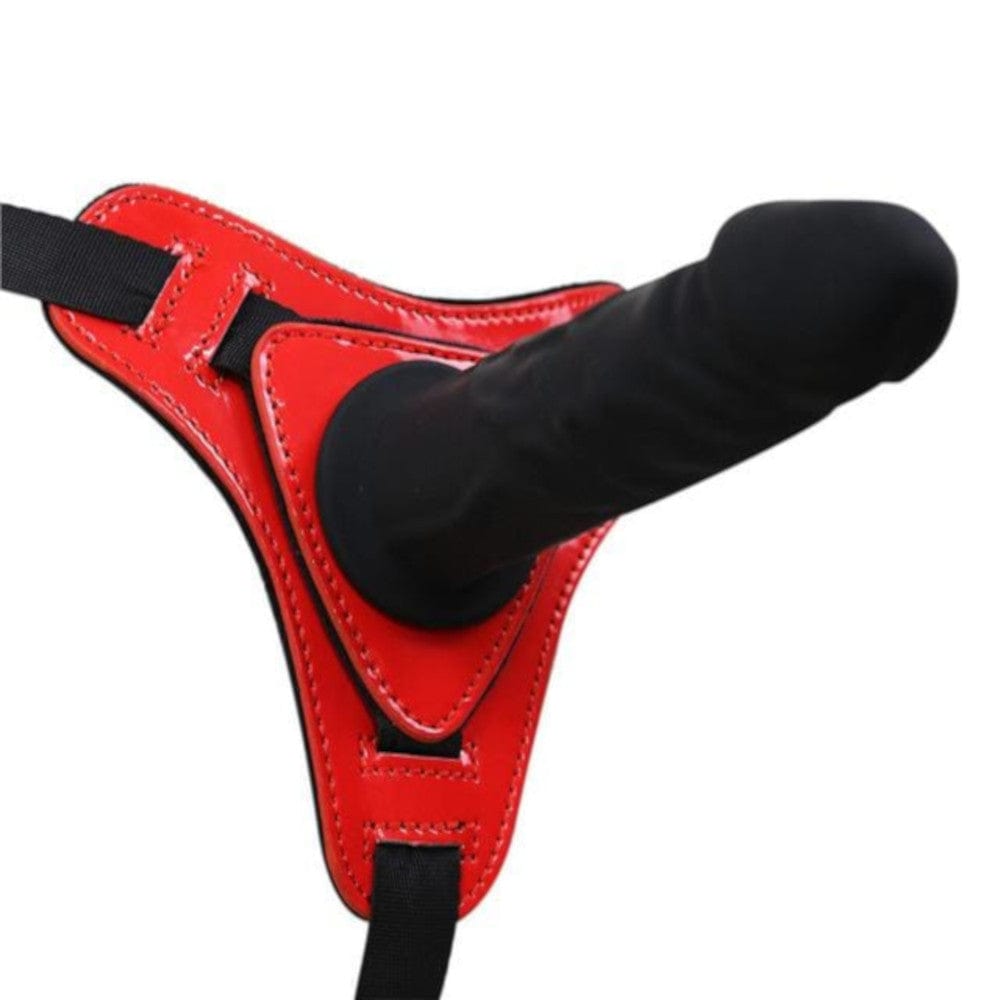 A close-up image of the lifelike glans and veiny body of the strap on, designed for intense stimulation.