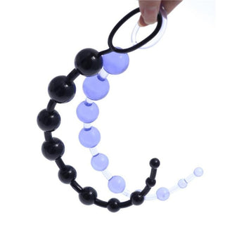 This is an image of Sleek Jelly Beads in blue silicone material featuring a circular handle for easy manipulation and control.