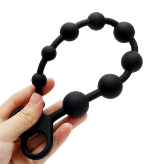 This is an image of the Deep Sensations Silicone Long Ball String, offering an edge of sophistication for intimate exploration.
