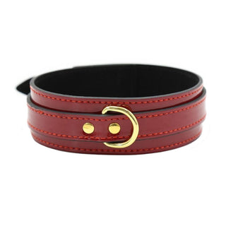 A red and black Well Crafted Leather BDSM Choker with adjustable length and a rebellious touch.