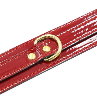 The Well Crafted Leather BDSM Choker in red and gold, a perfect fit for different sizes with a stylish appeal.