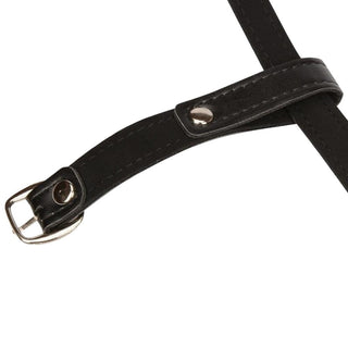 What you see is an image of the Extreme Bondage Mouth Toy with PU leather straps in black and metal gag in silver.