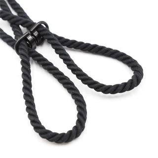 Picture of Black Nylon and Polyester Rope Restraint with a sturdy clasp mechanism for secure fastening.