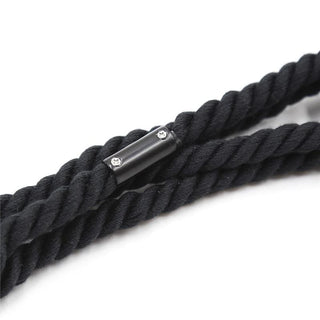 Photo of Black Nylon and Polyester Rope Restraint, soft against the skin yet firm for maintaining control.