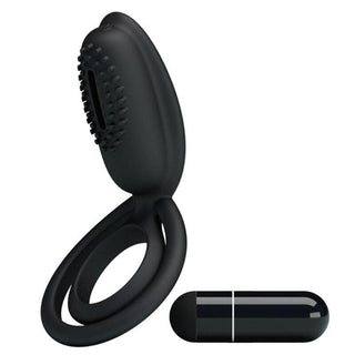 Dual-action clit-friendly silicone cock and ball ring for enhanced pleasure.