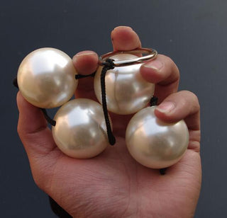 View of Rear Entry Play Gold Anal Beads, a simple yet delightful toy for intimate play sessions.
