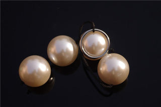 This is an image of Rear Entry Play Gold Anal Beads, featuring four smooth, hard plastic beads for exquisite sensations.