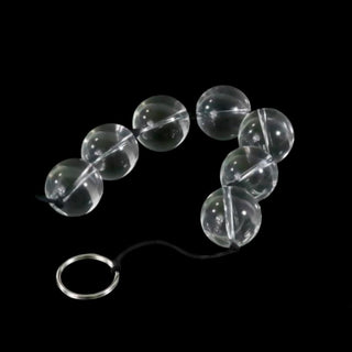 Observe an image of Clear Orbs Glass Anal Balls in clear color made for thrilling pleasure potential.