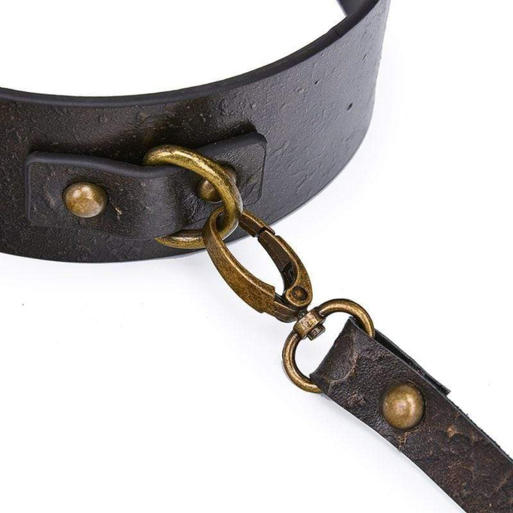 Pictured here is an image of the high-grade, synthetic leather material of the BDSM Collar Submissive Choker.