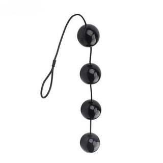 This is an image of Blacked Out String Silicone Plug showing different sizes available - medium at 21.65 inches and large at 23.62 inches.
