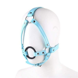 What you see is an image of Punishment Ring Gag in turquoise PU leather material with adjustable straps for a comfortable fit.