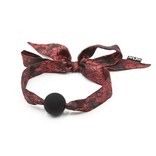Pictured here is an image of Bondage Games Sexy Gag Mouth - Lifelike silicone sphere with chic polyester lace for heightened sensual play.