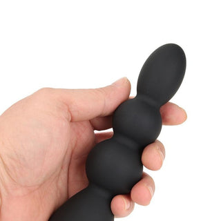 A pleasure tool designed for deep and satisfying exploration, with a heart-shaped bead for a unique experience.
