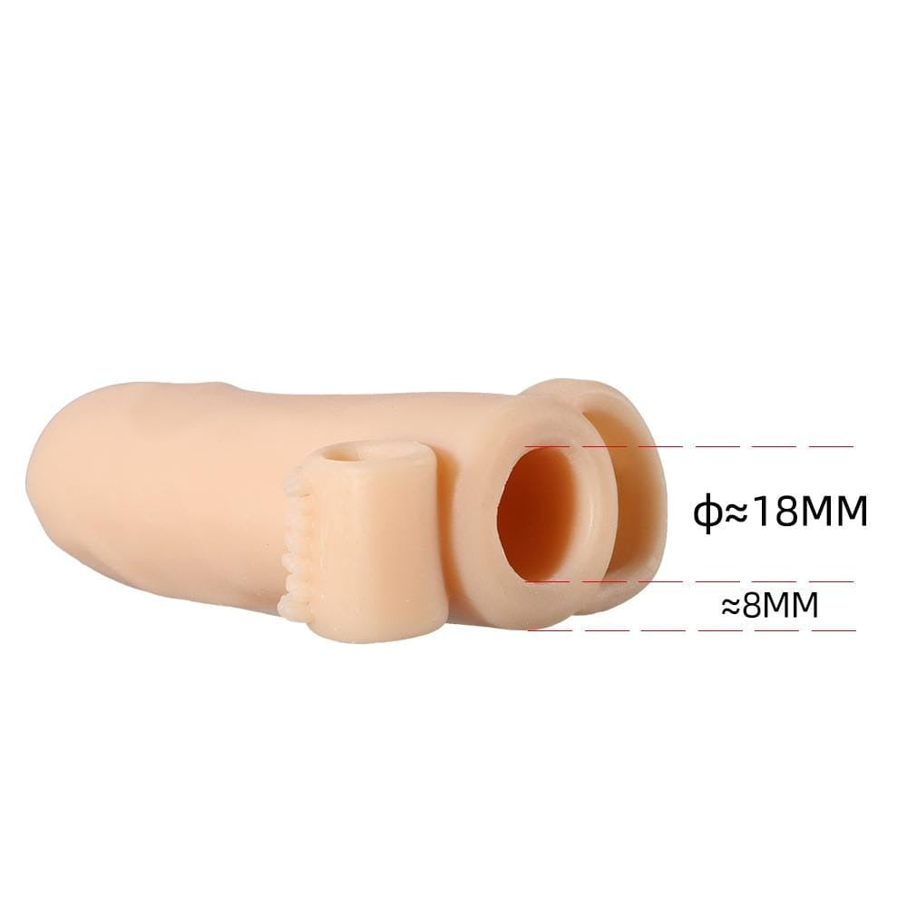 Presenting an image of Uncircumcised Extension Vibrating Cock Sleeve Stimulator in flesh and white colors with dimensions of 5.04 length and 1.34 width.
