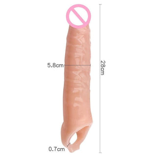 Presenting an image of Intimacy-Enhancing Huge Realistic Cock Sleeve Extension with a textured exterior for enhanced sensation during use.