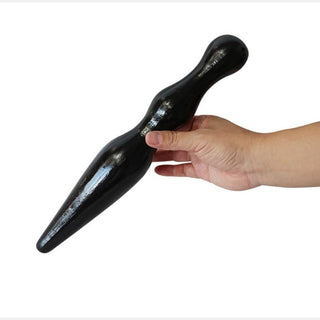 Image of the Double-ended Super Big Silicone Plug in black and flesh colors, with dimensions including a total length of 13.58 inches and beads of varying sizes.