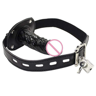 In the photograph, you can see an image of Locked and Loaded BDSM Silicone Gag in Rose Red color with a silicone dildo attached to a belt-type strap.
