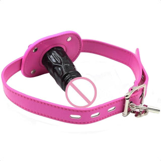 Pictured here is an image of Locked and Loaded BDSM Silicone Gag with an adjustable strap ranging from 18.11 inches to 22.83 inches in length.