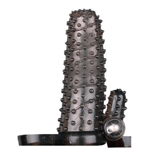You are looking at an image of Single-Frequency Hollow Vibrating Cock Sleeve Extender in black color for a bold look.