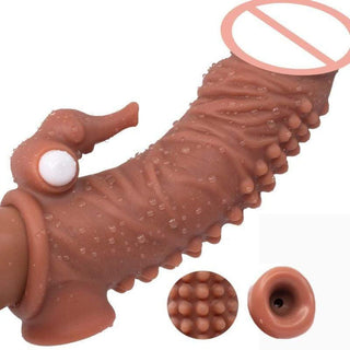 This is an image of the Horny Elephant Thick Vibrating Silicone Penis Extension with a built-in bullet vibrator for added arousal and wild intimacy.