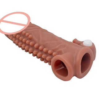 Presenting an image of the Horny Elephant Thick Vibrating Silicone Penis Extension in brown color, designed to provide a fulfilling sensation and precise stimulation.