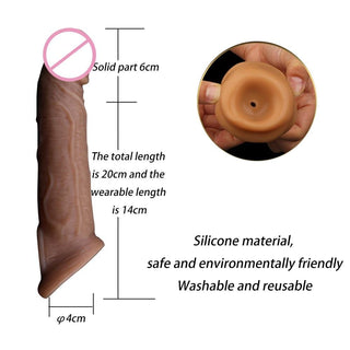 Feast your eyes on an image of Bigger Aspirations Thick Realistic Cock Sleeve Penis Extender featuring a hole at the tip for extended wear and noticeable size increases over time.