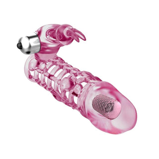 Pink Horny Bunny Vibrating Penis Sheathe - A close-up image of the silicone sleeve with a lifelike penis glans head and geometrically designed body for added stimulation.