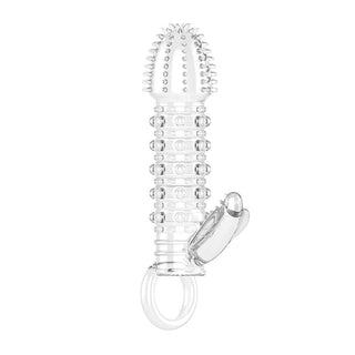In the photograph, you can see an image of Pure Satisfaction Vibrating Cock Sheath Extension showcasing its exquisite design and clit massagers.
