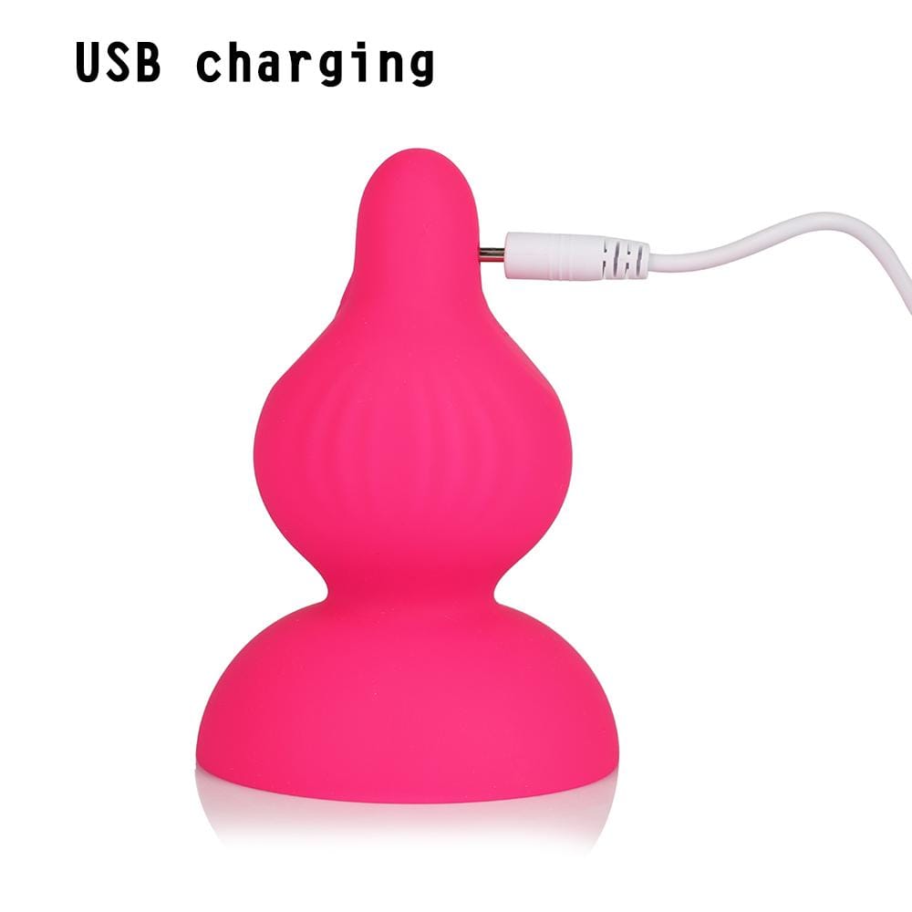 What you see is an image of No-Frills Breast Toy Vibrator Rechargeable Stimulator Nipple Sucker with dome-shaped cups for an intimate fit.
