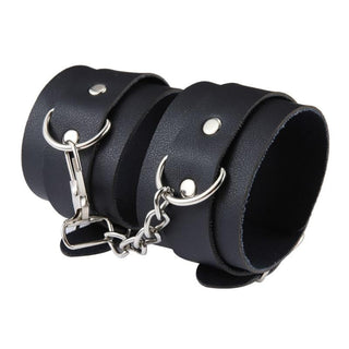 This is an image of Elegant Leather Sex Cuffs for Bondage Restraints in Pink, crafted from synthetic leather for comfort and safety.