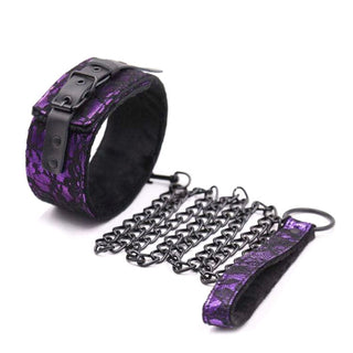 Presenting an image of Petplay Fetish Choker Purple Kink Collar And Leash set, featuring a vibrant purple collar with adjustable black lacquered metal leash for absolute control.
