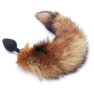 Featuring an image of Fox Tail Plug Silicone, Brown 17 featuring a firm silicone plug and a life-like tail for untamed fantasies.