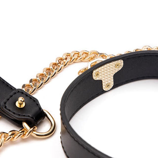This image displays the comfortable luxury and safety of the leather collar with a removable chain.