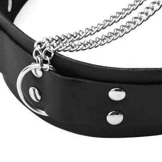 A visual representation of Collar Slave Punishment Collar With Nipple Clamps, offering a rebellious sub vibe with metal studs and adjustable clamps.