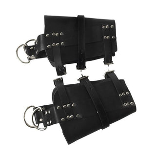 Here is an image of bondage ankle cuffs tailored for comfort and security, measuring 7.87 inches in length with smooth yet sturdy PU leather texture. Features adjustable belts and rings for versatile positioning and scenarios.