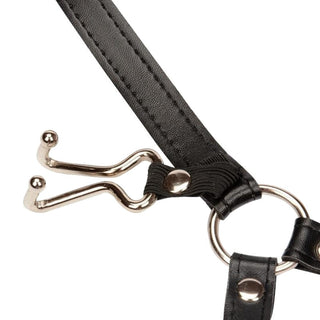 An image highlighting the premium PU leather straps and sturdy metal gag of the Extreme Bondage Mouth Toy.