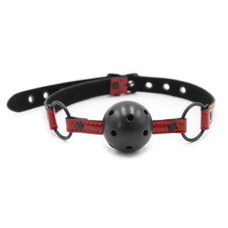 Displaying an image of Breathe Easy Gag Ball with brown synthetic leather straps and black gag for BDSM play.
