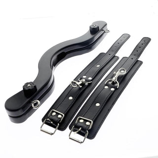 Black CBT Humbler With Cuffs, measuring 15.6 inches in length and 0.75 inches in width, featuring a dual-action restraint system for intense sensations and pleasure.