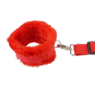 Here is an image of Red Furry Sex Bed Restraints made from durable nylon and plush synthetic fur for a safe and sensual experience.