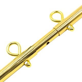 Gold Adjustable Bondage Spreader Bar crafted from high-quality metal for safe and pleasurable experiences.