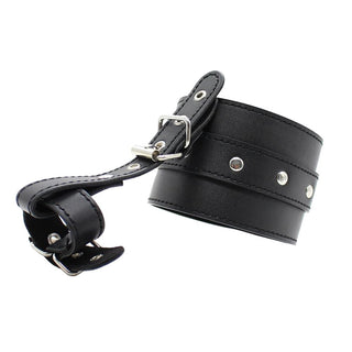 What you see is an image of Foot and Toe Cuffs in Adjustable Black Leather for controlled passion and immersive play.