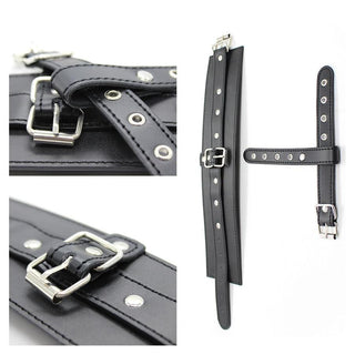 This is an image of Thumb Locking BDSM Leather Sex Handcuffs for Play, crafted from soft PU leather for comfortable restraint.