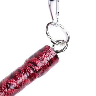 A vibrant image of Doggy Ankle Padded Spreader Bar for Restraint in red color with padded bar and four clips.