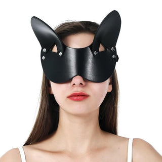 Pictured here is an image of See No Evil Rabbit Mask, a black synthetic leather mask with playful rabbit ears, designed for heightened sensory experiences and intimate moments.
