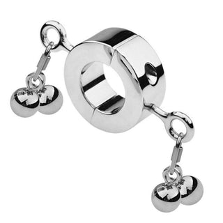 Pictured here is an image of Metallic Testicle Stretcher Weights with thick ring and four ball-shaped weights for intense sensations.