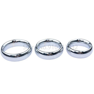 Take a look at an image of Stainless Cock Weight Trainer, a sleek stainless-steel ring designed to enhance strength and stamina for intimate performance.