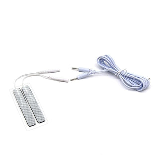 A pair of white electrode strips for stimulating erogenous zones with electrifying shocks and tickling sensations.