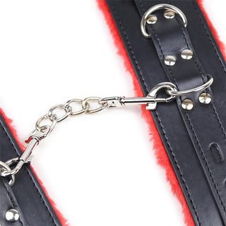A medium-sized bracelet made of synthetic leather with a unique dual-locking feature for added safety.